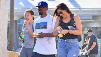 Annalise Bishop with her parents at Disneyland.